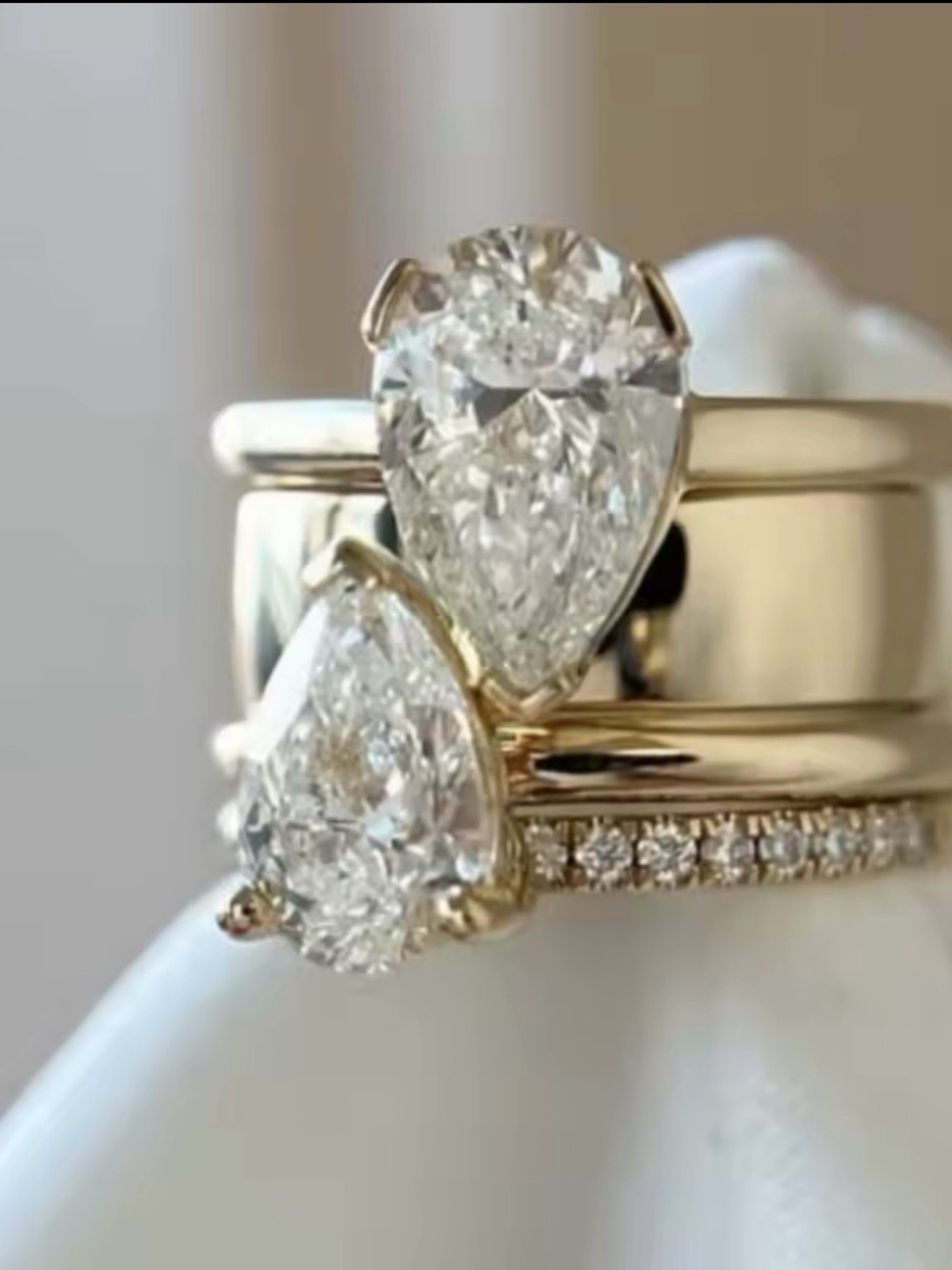 Elegant Gold Pear Diamond Ring Stack - White Diamond Accents